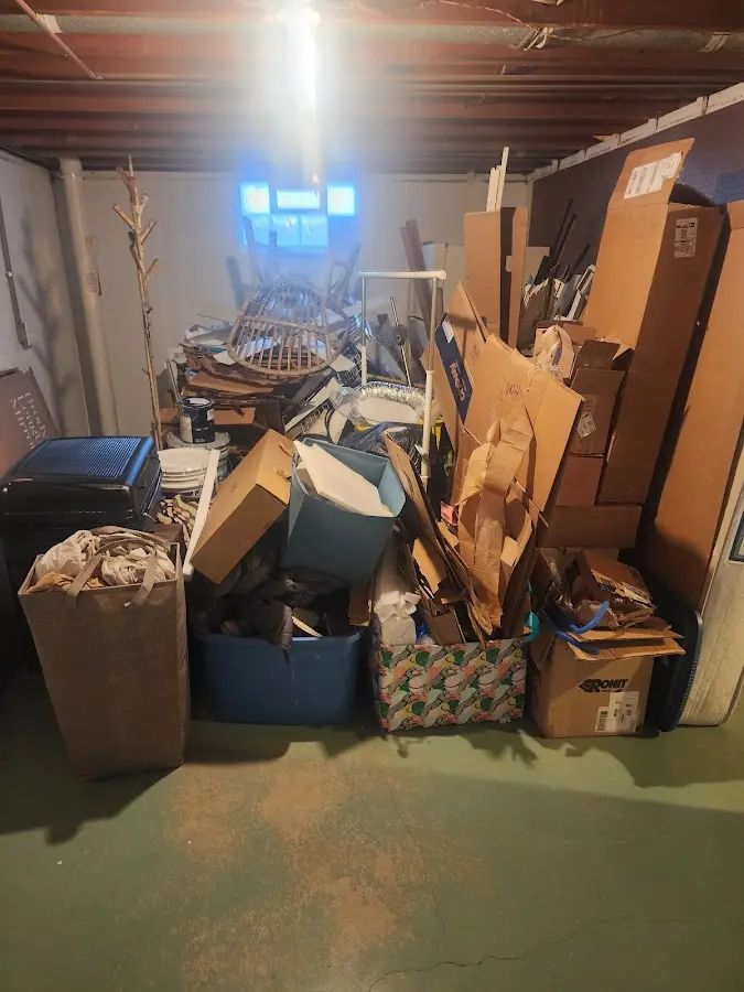 Roll-off dumpster container at job site for Concrete Dumpster Rental in Camp Swift